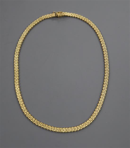 A 750 yellow metal fancy bead and brick-link necklet, approx. 30 grams.